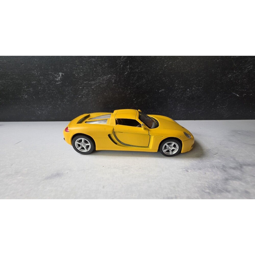 Porsche Carrera GT Yellow Toy Car USED